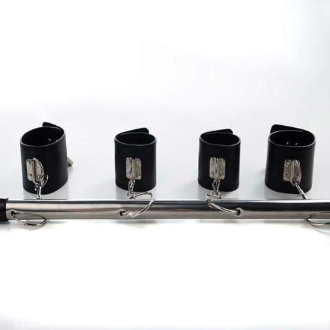 Spreader bar with wrist and ankle cuffs