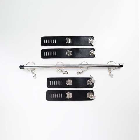 Spreader bar with wrist and ankle cuffs